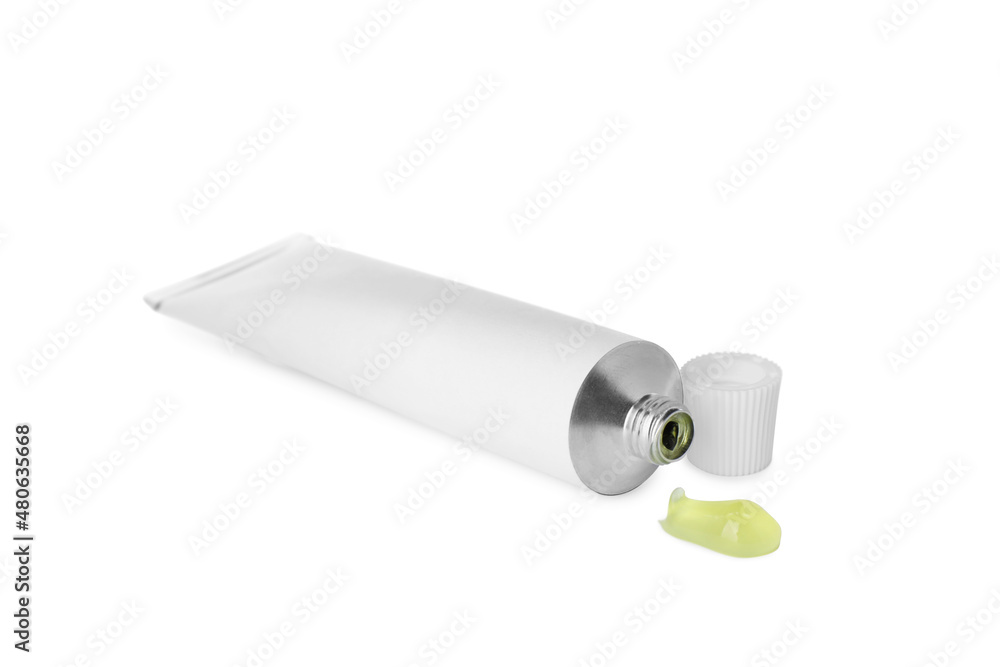 Open tube with ointment on white background Open tube with ointment on white background