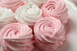 Delicious white and pink marshmallows on plate, closeup