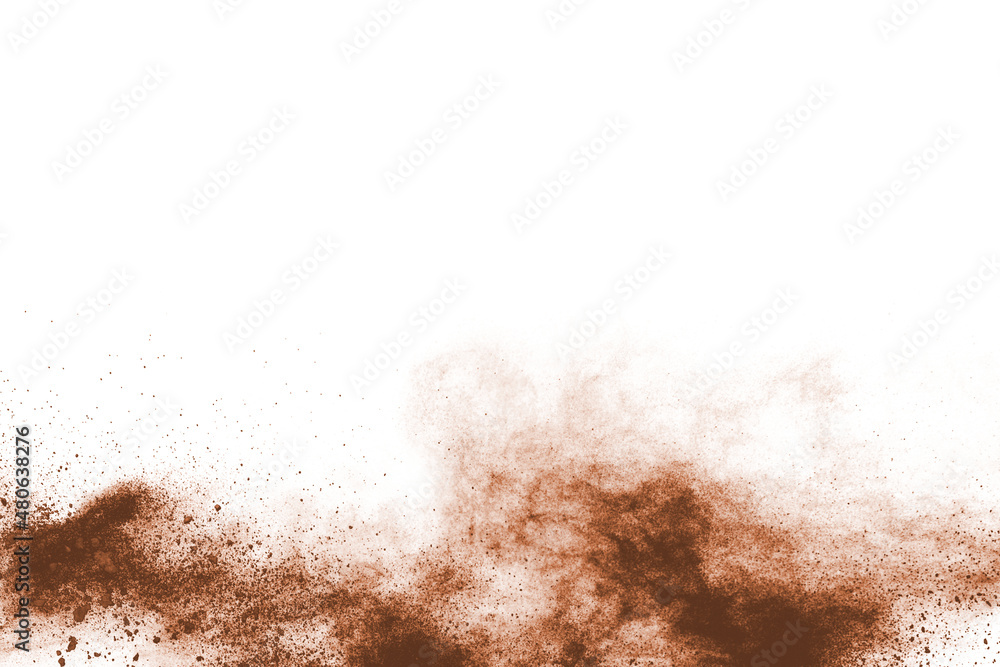 Brown powder explosion isolated on white background. Brown powder explosion isolated on white background.
