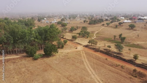 Aerial Bolgatanga Ghana rural bush savanna drought part 2. Bolga is the crafts center of Upper Region of Ghana. Dry savannah landscape. Scattered homes and villages. Historical border of Burkina Faso. photo