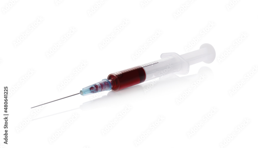 Fototapeta premium Plastic syringe with blood isolated on white