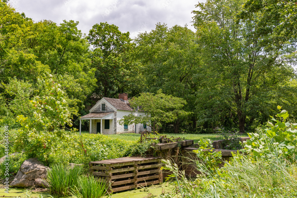 The C & O Canal, at Chesapeake & Ohio Canal National Historical Park, Maryland. Lock house at Lock 7 on a summer afternon.