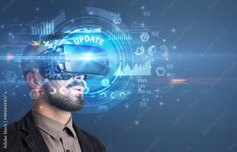 Businessman looking through VR glasses Businessman looking through VR glasses