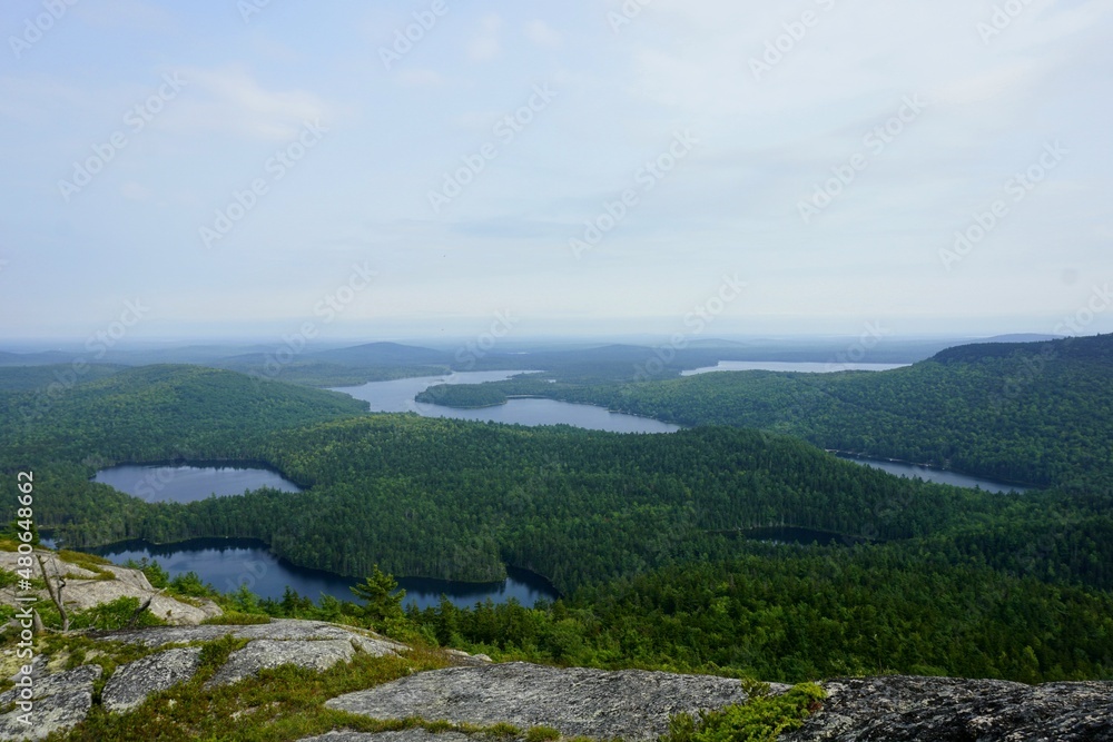 Amazing view over the landscape of Maine. With a lot of lakes and forests.