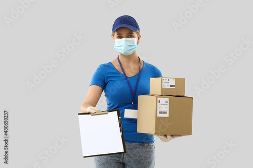 Female courier in medical m...