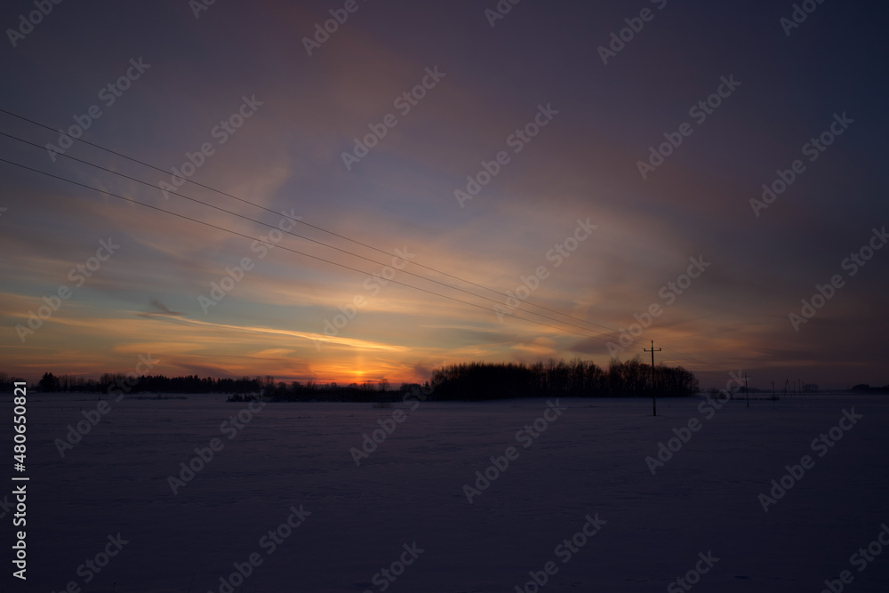 Colorful sky at sunset time with winter scenery. Colorful sky at sunset time with winter scenery.