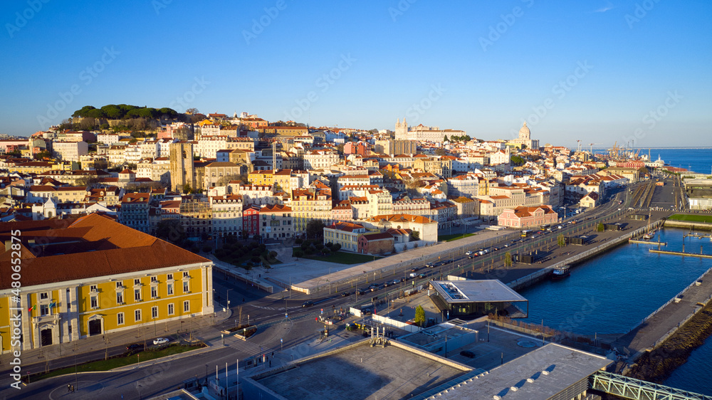 Aerial drone view over Alfama District, Lisbon, Portugal. National Pantheon and Lisbon Cathedral in the background.