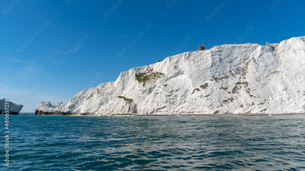 Fototapeta premium View of chalk cliffs and building near The Needles in Alum Bay, Isle of Wight, United Kingdom