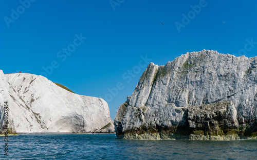 View of the Needles and cliffs in Alum Bay, Isle of Wight, United Kingdom photo