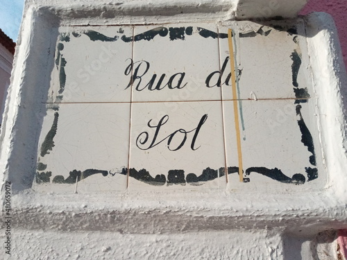 Street sign, made of white tiles with blue letters, identifying Rua do Sol in the historic center of São Luís MA, Brazil