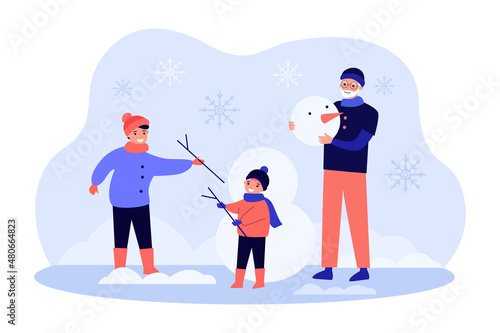 Happy mother, grandfather and child building snowman outdoor