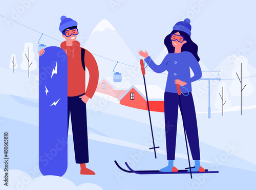 Winter vacation of happy skiers at ski resort