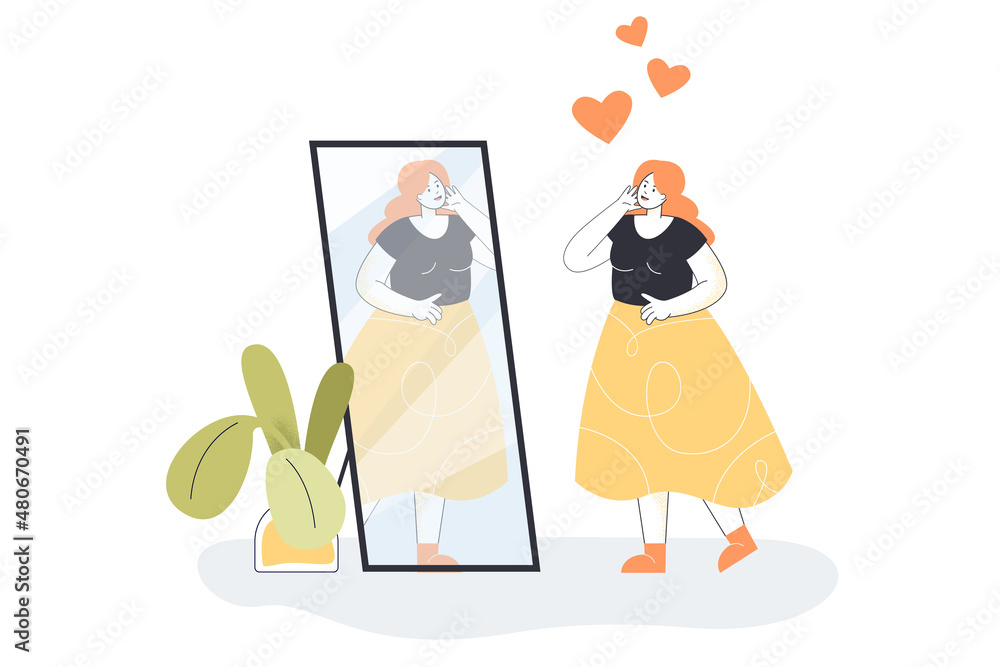 Fototapeta premium Smiling narcissist woman standing in front of mirror