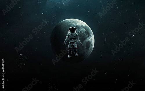 Fototapeta Naklejka Na Ścianę i Meble -  Astronaut on the background of the moon in space. 5K realistic science fiction art. Elements of image provided by Nasa