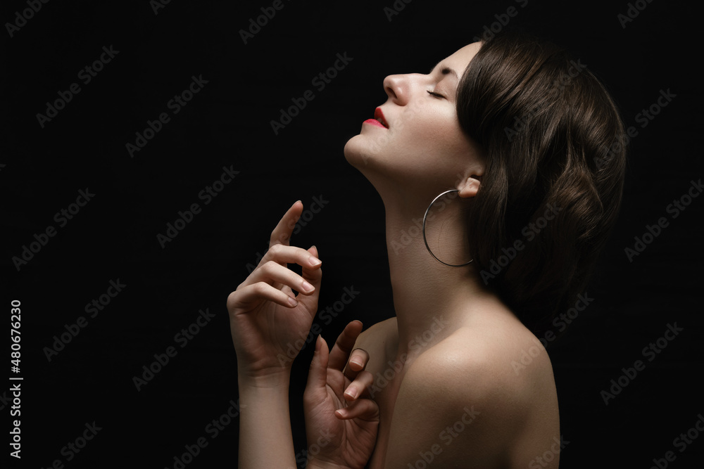 Fototapeta premium sensual woman in dark