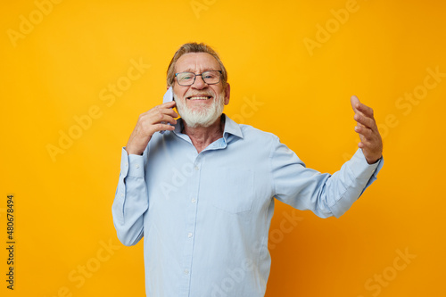 elderly man talking on the phone emotions isolated background