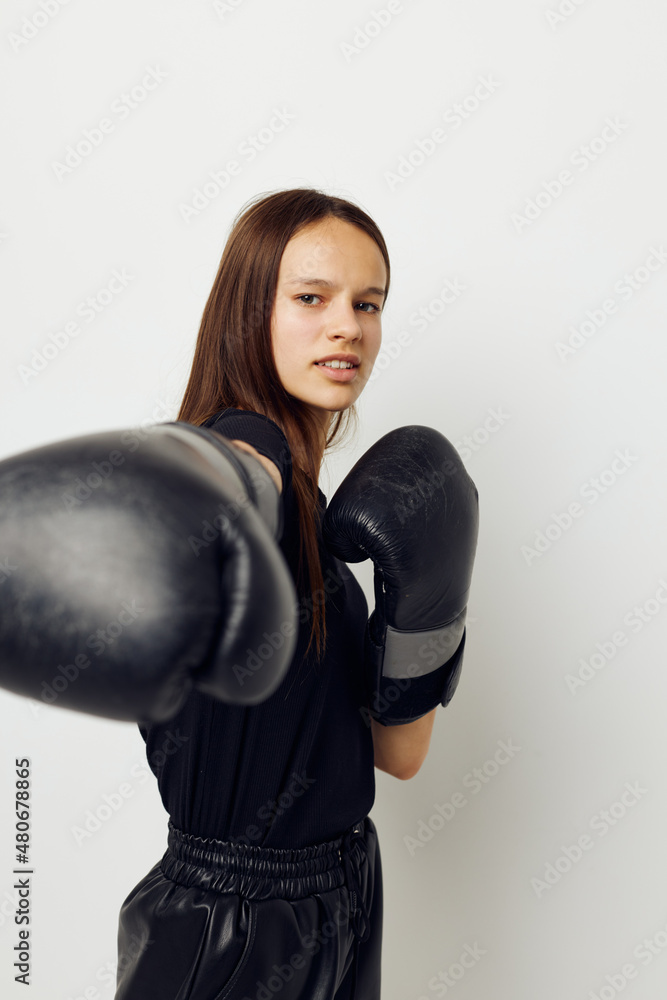 beautiful girl in black sports uniform boxing gloves posing fitness training beautiful girl in black sports uniform boxing gloves posing fitness training
