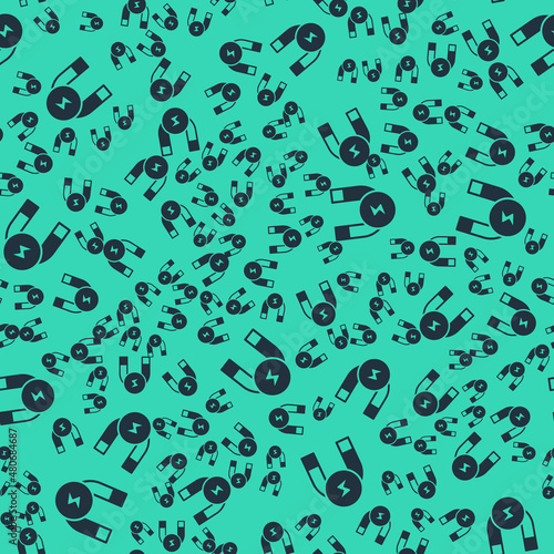 Black Magnet icon isolated seamless pattern on green background. Horseshoe magnet, magnetism, magnetize, attraction. Vector