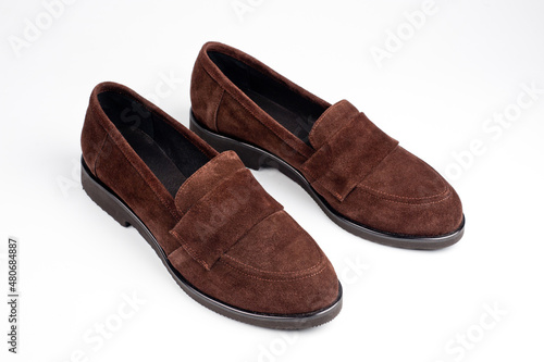 Dark brown suede slippers. Close-up shot.