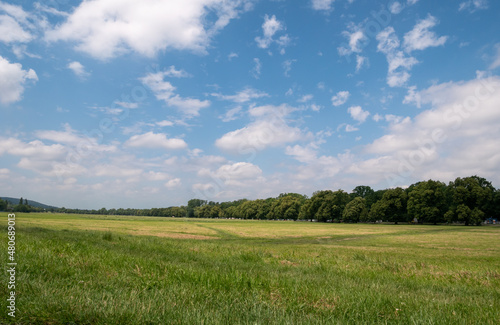 Blonia Park Krakow meadow panorama in Kraków, with Jordan Park (Park Henryka Jordana) in background. Krakowskie Błonia.