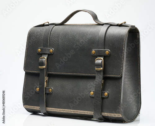 Side view of black leather briefcase