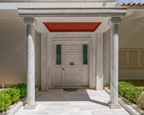 elegant house impressive entrance with white door and columns