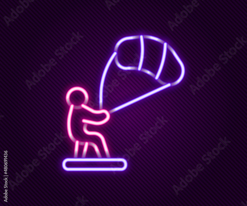 Glowing neon line Kitesurfing icon isolated on black background. Colorful outline concept. Vector