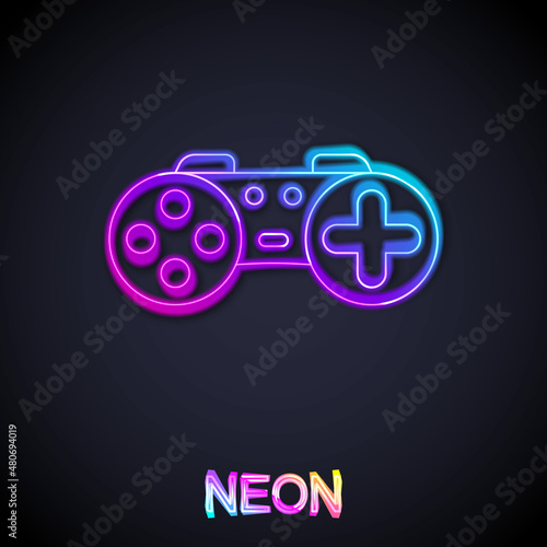 Glowing neon line Gamepad icon isolated on black background. Game controller. Vector
