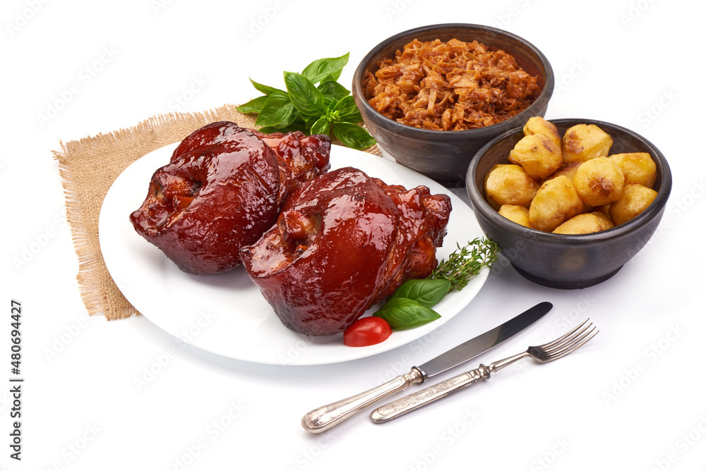 Roasted ham hock with sauerkraut, isolated on white background. Roasted ham hock with sauerkraut, isolated on white background.