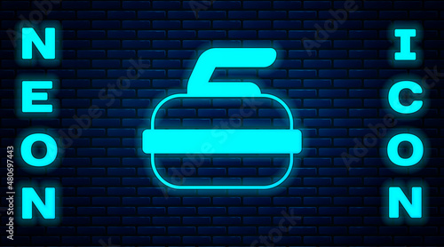 Glowing neon Stone for curling sport game icon isolated on brick wall background. Sport equipment. Vector