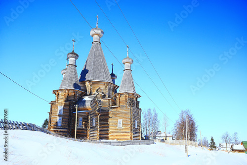 wooden church in the Russian north landscape in winter, architecture historical religion Christianity photo