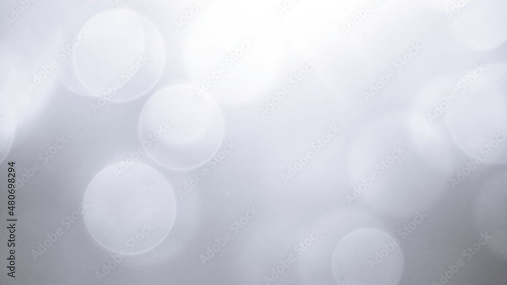 The illuminated white bokeh image can be used as a background illustration or add text. The illuminated white bokeh image can be used as a background illustration or add text.