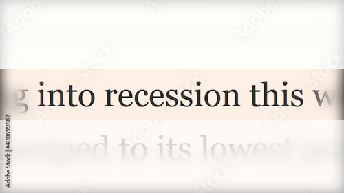 CLOSE-UP: Mention of the recession in the lines of electronic publications. Global economic crisis in the media news. Words with different fonts are rapidly changing.