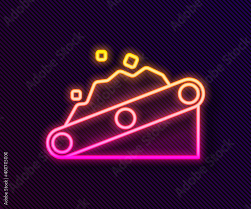 Glowing neon line Conveyor belt carrying coal icon isolated on black background. Vector