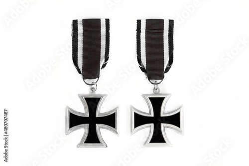 Konstfotografi Old medal Cross on a white background.