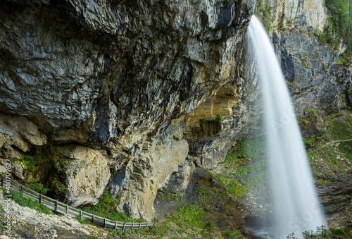 Wide angle view of the Johannes Waterfall with hiking trail in Untertauern, Austria