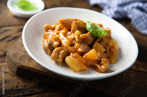 Homemade chicken ragout with pineapple