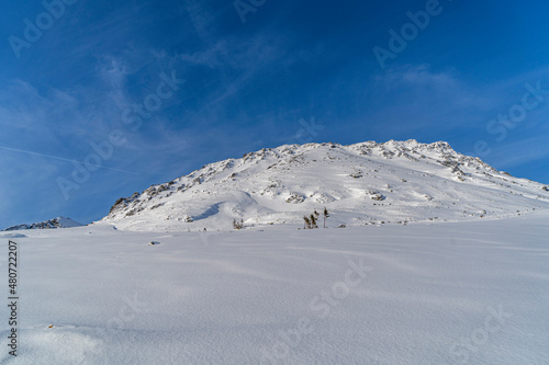 Tatra Mountains, Winter mountain landscape in Tatra mountains, high mountains covered with snow sunny frosty winter weather Poland