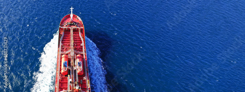 Fotografie, Obraz Aerial drone ultra wide photo of oil - petrochemical tanker cruising deep blue o