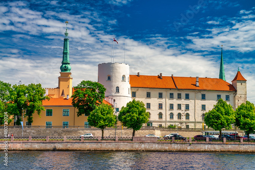 Riga buildings on a sunny day along Daugava river, Latvia.