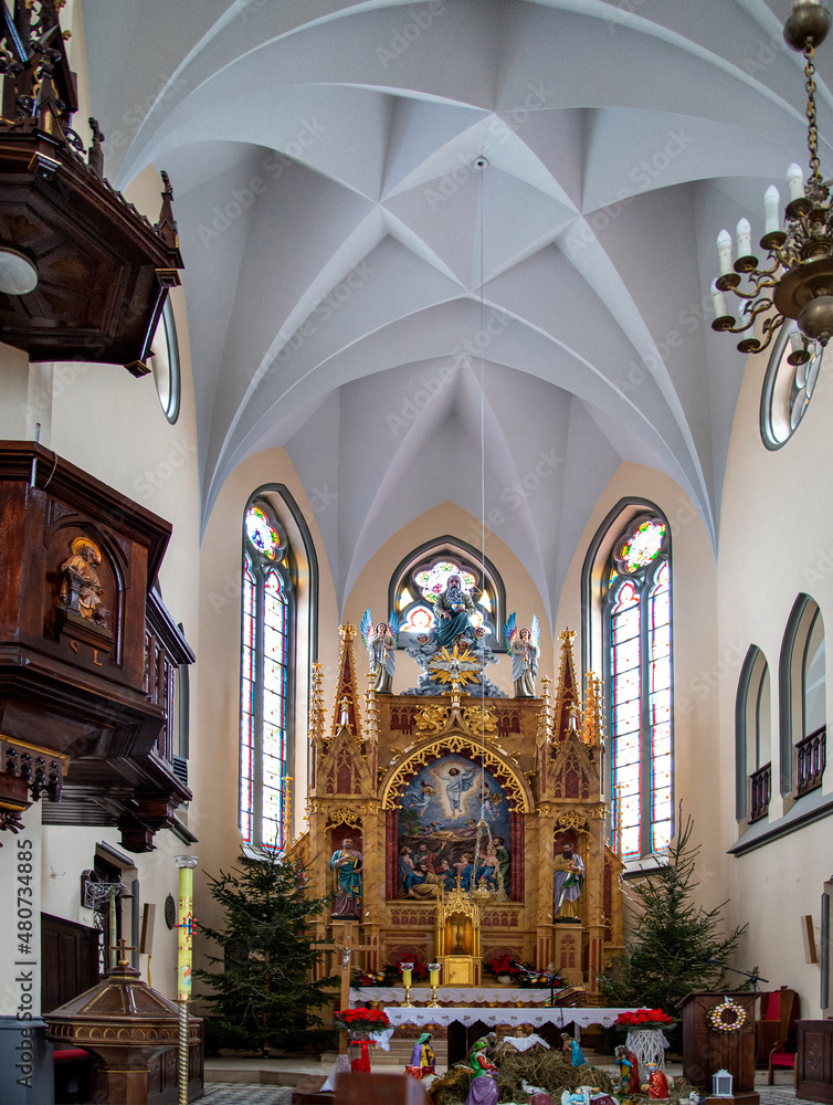 Exterior and interior view of the Neo-Gothic Catholic Church of the Transfiguration of Jesus built in 1907 in the village of Poświętne in Podlasie, Poland.