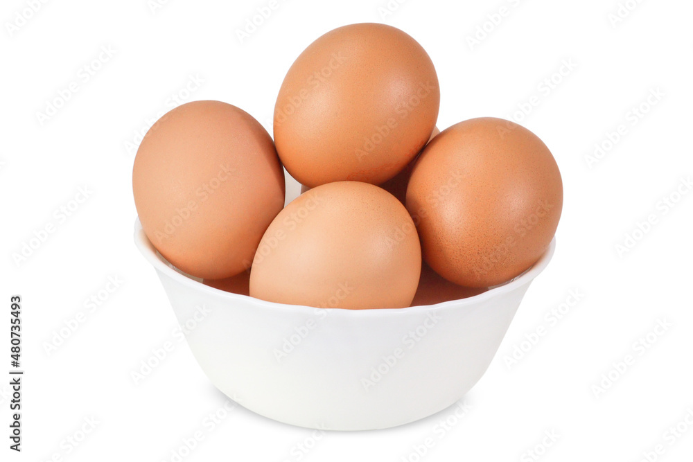 Chicken eggs on an isolated white background. Eggs in a white bowl Chicken eggs on an isolated white background. Eggs in a white bowl