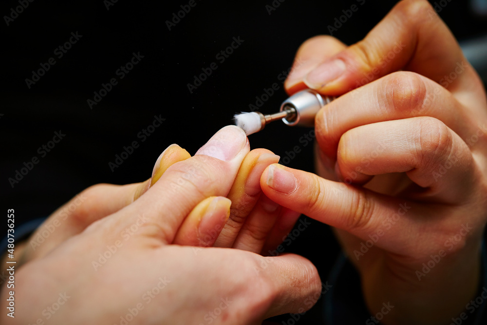 Nail art, close-up of hands trimming nails