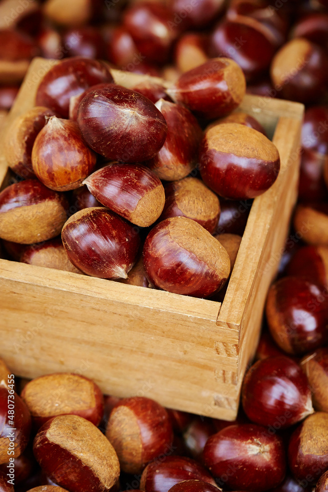 Chestnuts on display in a traditional market Chestnuts on display in a traditional market