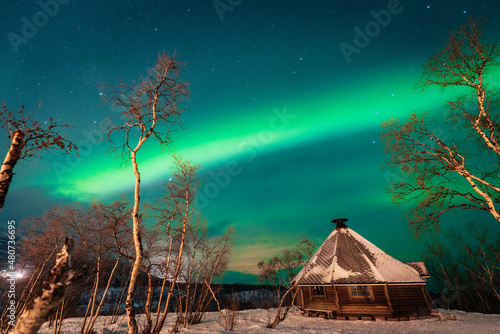 Obraz na płótnie Northern Lights, aurora borealis over Abisko, Swedish Lapland. w salonie