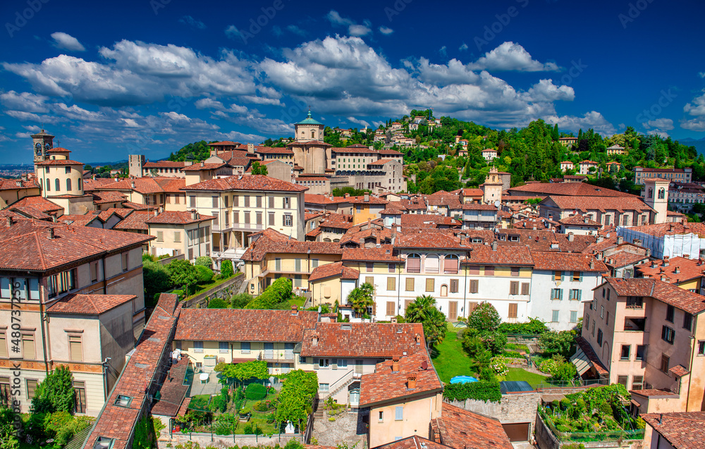 Aerial view of Bergamo Alta buildings and park, Italy.
