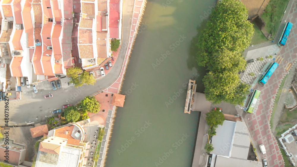 Malacca, Malaysia. Aerial view of city homes and skyline from drone on a clear sunny day