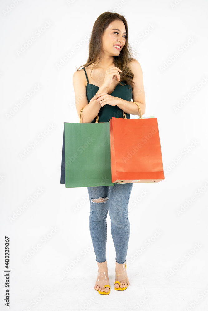 Woman holding paper bags on white background. Woman holding paper bags on white background.