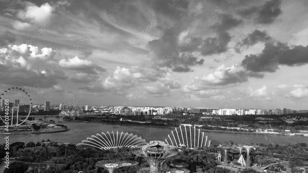 Marina Bay area in Singapore. Aerial view of city outskirts on a clear sunny day from drone
