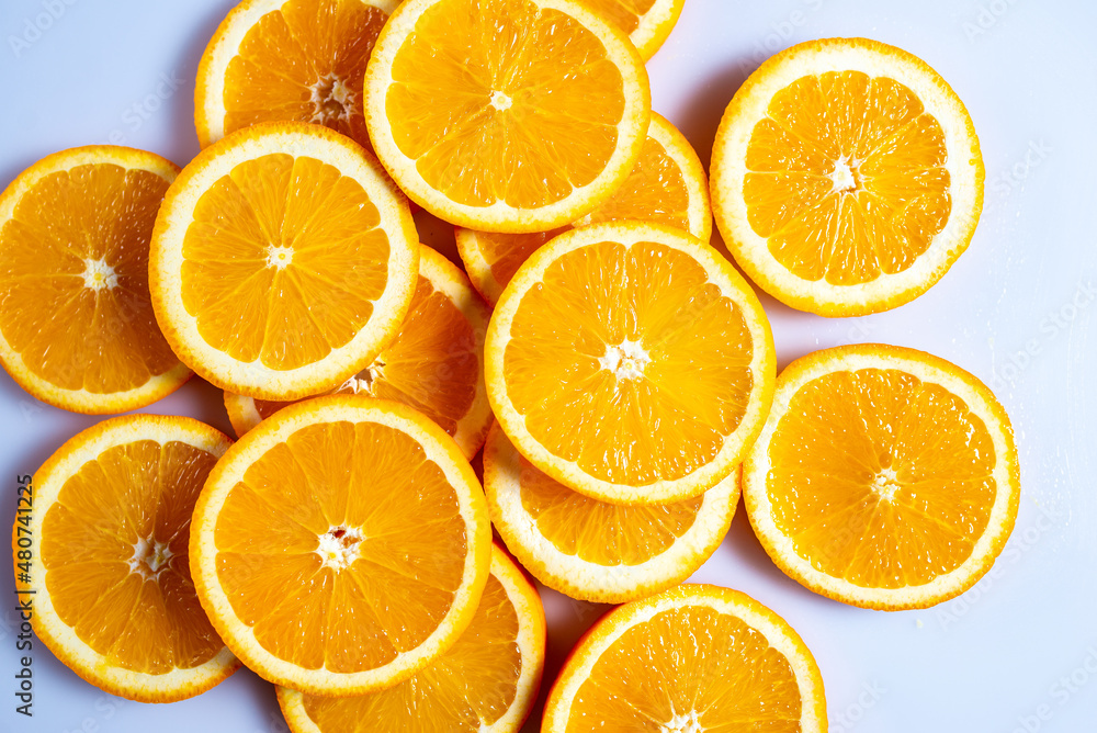 Fresh slised oranges on white background. Top view. Fresh slised oranges on white background. Top view.